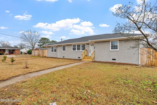 single story home with a front yard