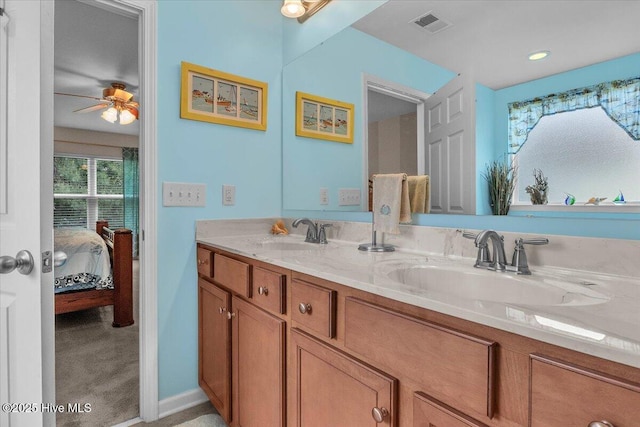 bathroom with vanity and ceiling fan