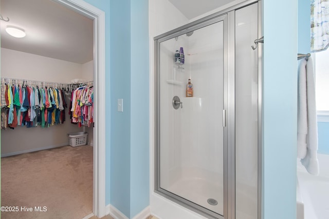 bathroom with an enclosed shower