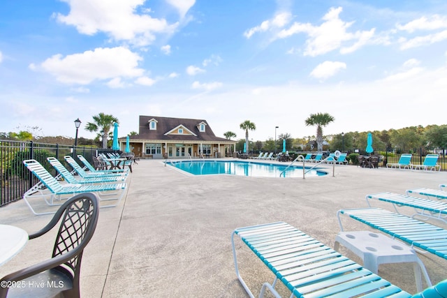 view of pool featuring a patio area