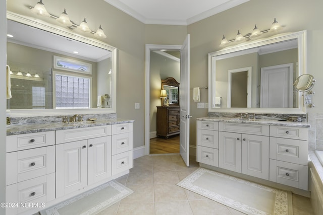 bathroom with ornamental molding, tile patterned flooring, and vanity