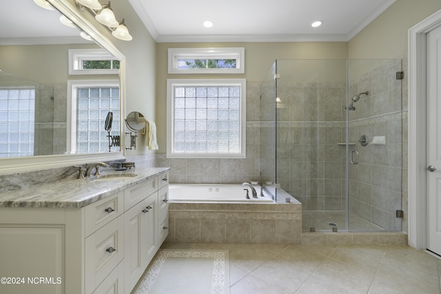 bathroom with ornamental molding, separate shower and tub, tile patterned flooring, and vanity