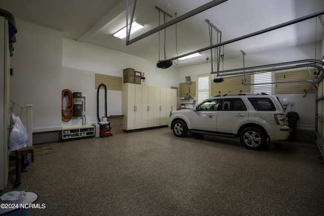 garage featuring a garage door opener