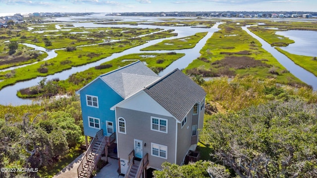 drone / aerial view with a water view