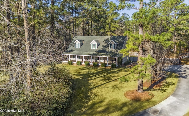 view of front of house with a front lawn and a porch