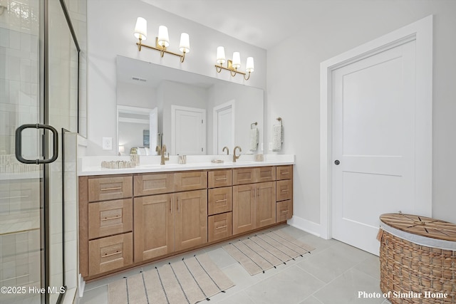 full bath featuring tile patterned flooring, a sink, double vanity, and a stall shower