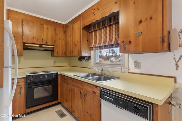 kitchen with sink and white appliances