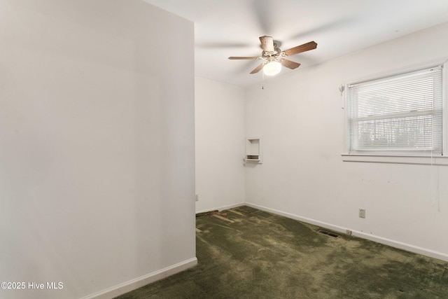 carpeted empty room with ceiling fan