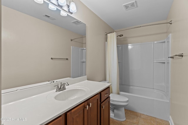 full bathroom featuring vanity, tile patterned flooring, shower / bath combo, and toilet