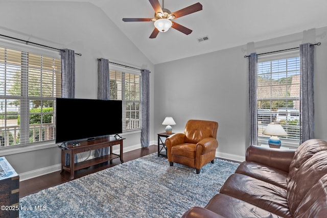 living room with vaulted ceiling, ceiling fan, and dark hardwood / wood-style flooring