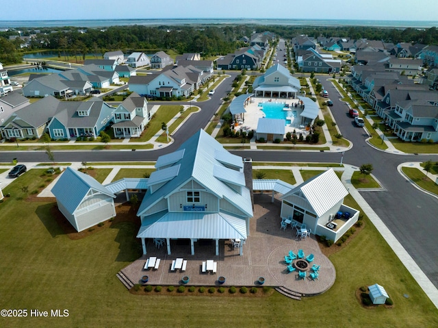 birds eye view of property with a residential view