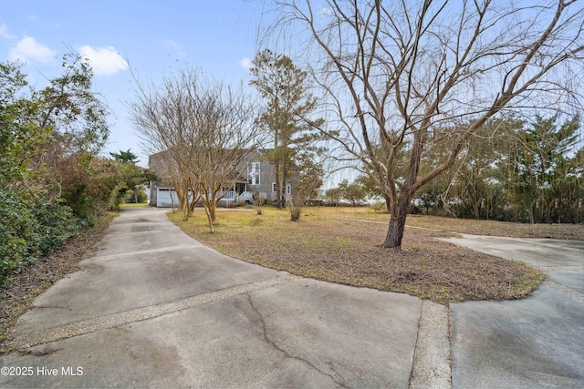 view of yard with a garage