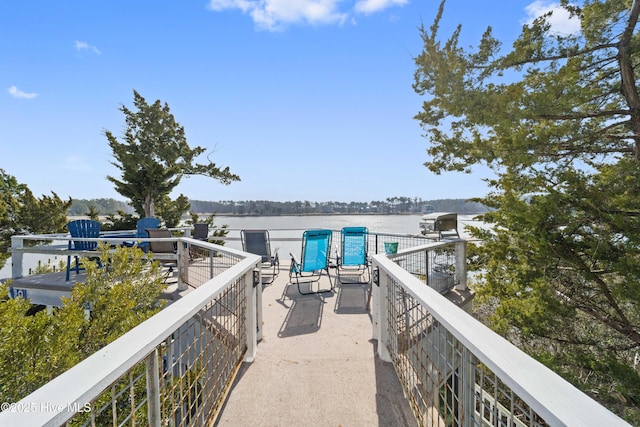 view of dock with a water view