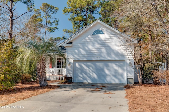 view of side of property featuring a garage