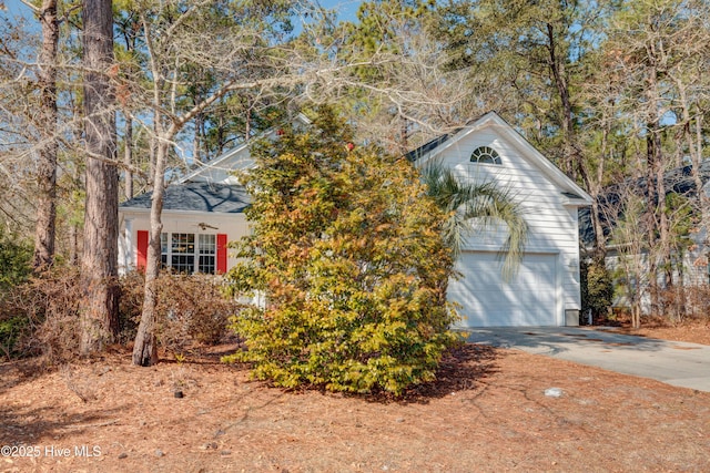 view of property hidden behind natural elements