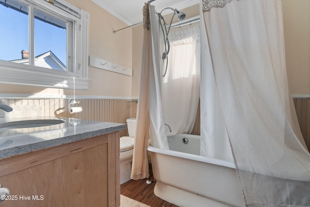 full bathroom with sink, plenty of natural light, toilet, and shower / bath combo with shower curtain