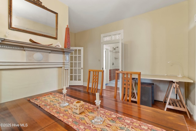 dining room with hardwood / wood-style flooring