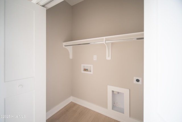 2660 Alvernia Dr, Castle Hayne, NC 28429 - laundry room featuring electric dryer hookup, washer hookup, light wood-style floors, and baseboards