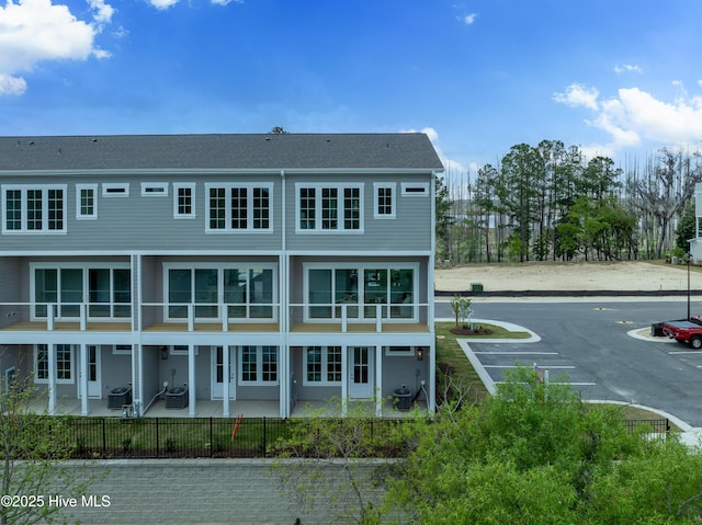 2660 Alvernia Dr, Castle Hayne, NC 28429 - rear view of property featuring a patio area and central AC unit