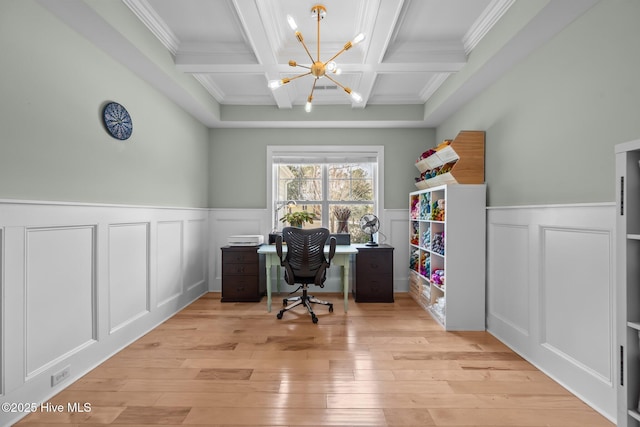 office with coffered ceiling, light wood-style flooring, beam ceiling, a decorative wall, and a notable chandelier