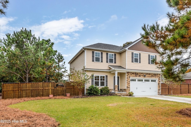 view of front of home with a garage and a front yard