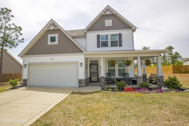 craftsman-style house with a porch and a front yard