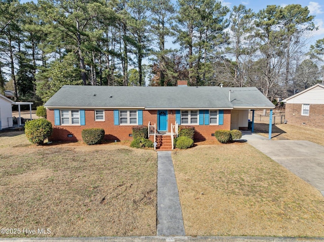 ranch-style house featuring a carport and a front lawn