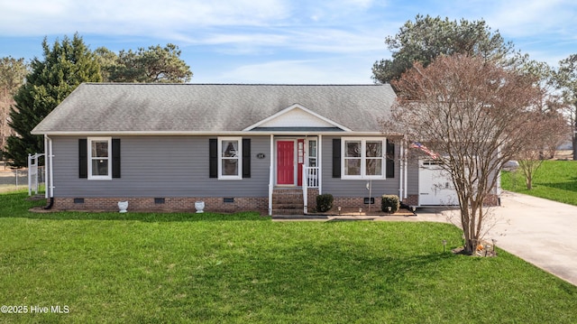 ranch-style home featuring a garage and a front lawn