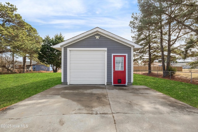 garage featuring a yard