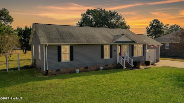 view of front of home featuring a lawn