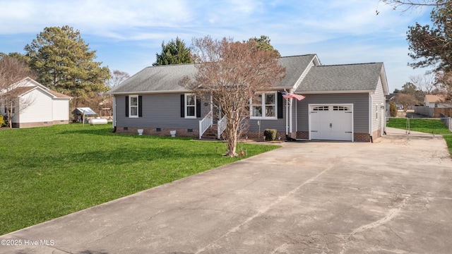 view of front of home with a garage and a front yard