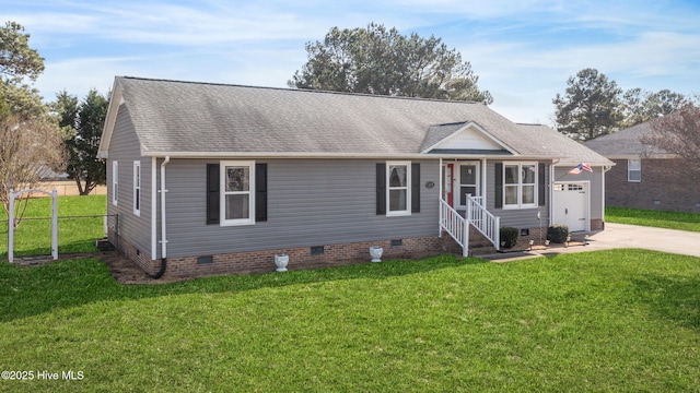 view of front of home featuring a garage and a front yard