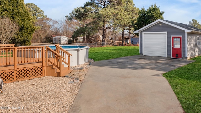 exterior space featuring a shed and a pool side deck