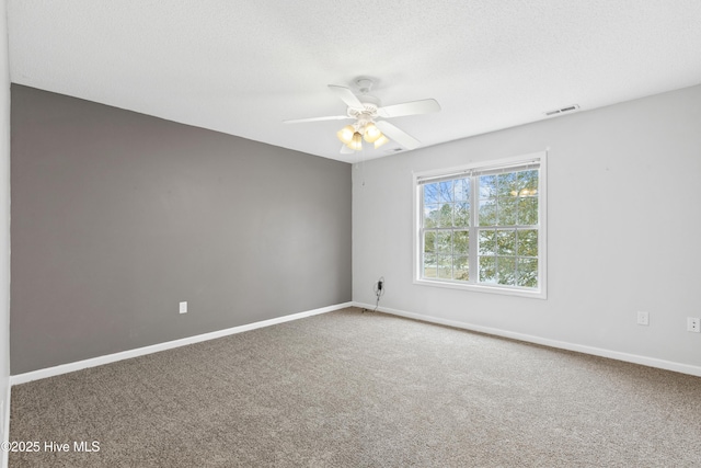 1652 Chadwick Shores Dr, Sneads Ferry, NC 28460 - carpeted spare room with baseboards and ceiling fan