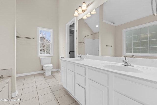 1652 Chadwick Shores Dr, Sneads Ferry, NC 28460 - bathroom with double vanity, tile patterned floors, a shower, baseboards, and toilet