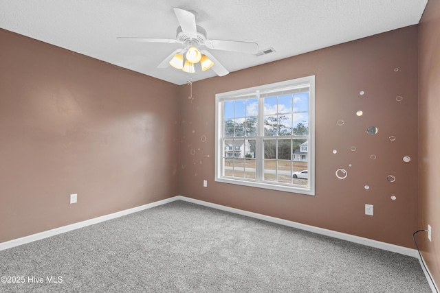 1652 Chadwick Shores Dr, Sneads Ferry, NC 28460 - carpeted empty room with ceiling fan and baseboards
