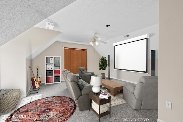 1652 Chadwick Shores Dr, Sneads Ferry, NC 28460 - cinema featuring carpet, ceiling fan, baseboards, a textured ceiling, and lofted ceiling