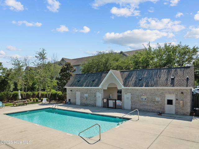 view of pool featuring a patio