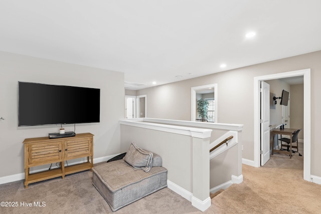 living room with light colored carpet