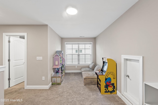 playroom featuring light colored carpet