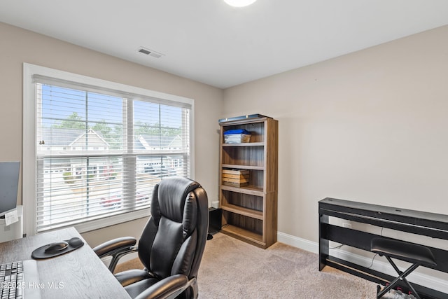 view of carpeted home office