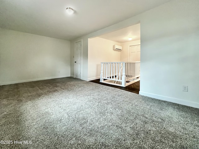 carpeted empty room with a wall mounted air conditioner