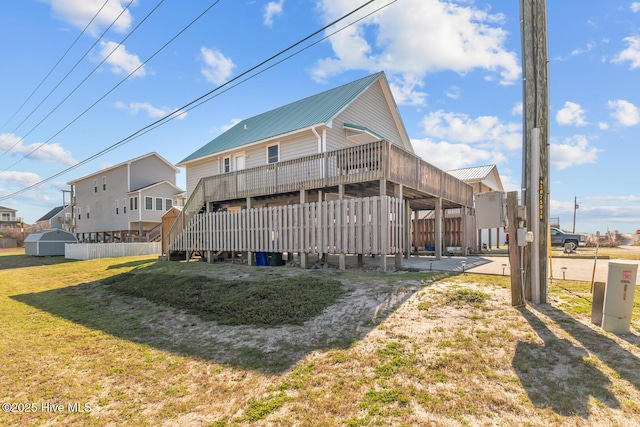 rear view of house with a lawn