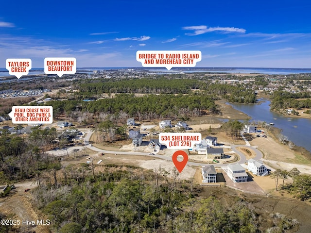 birds eye view of property featuring a water view