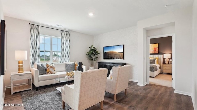 living room featuring dark hardwood / wood-style floors