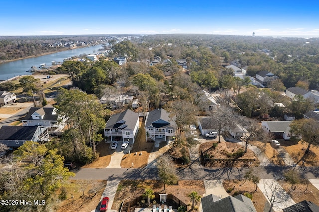 drone / aerial view featuring a water view and a residential view