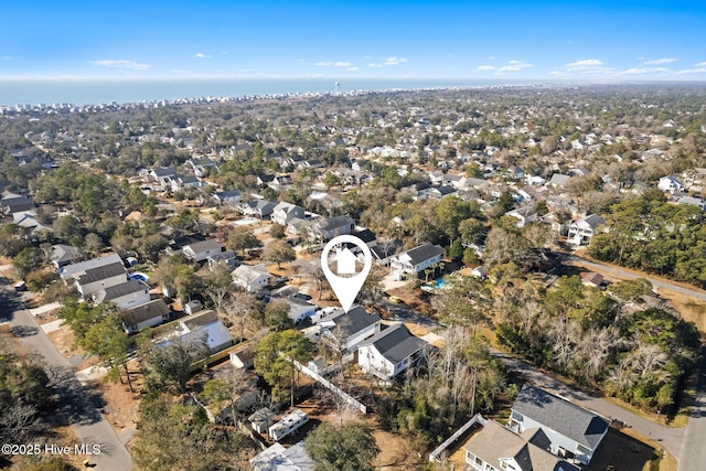 birds eye view of property with a residential view