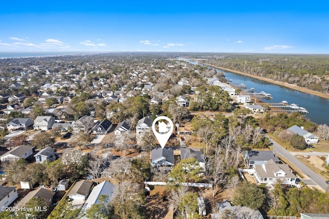 bird's eye view featuring a water view and a residential view