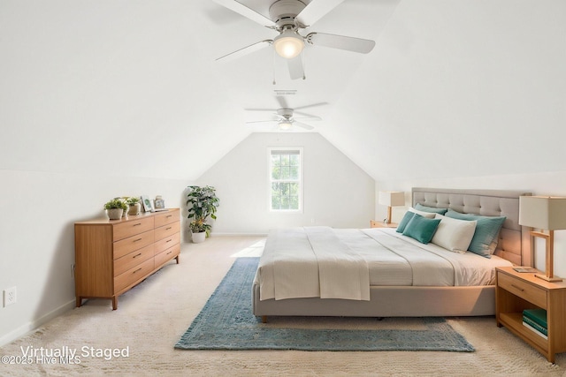 bedroom featuring carpet floors, baseboards, vaulted ceiling, and ceiling fan
