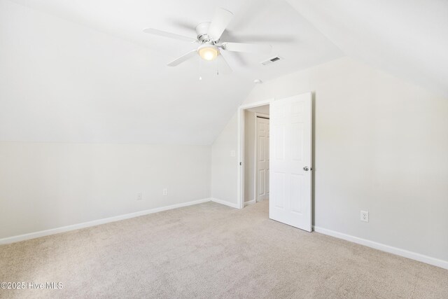 1010 Winterberry Cir, Leland, NC 28451 - hall with lofted ceiling, light carpet, and baseboards